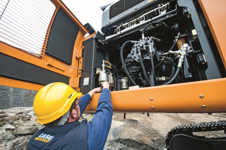 A fully trained CASE engineer servicing a CASE Excavator